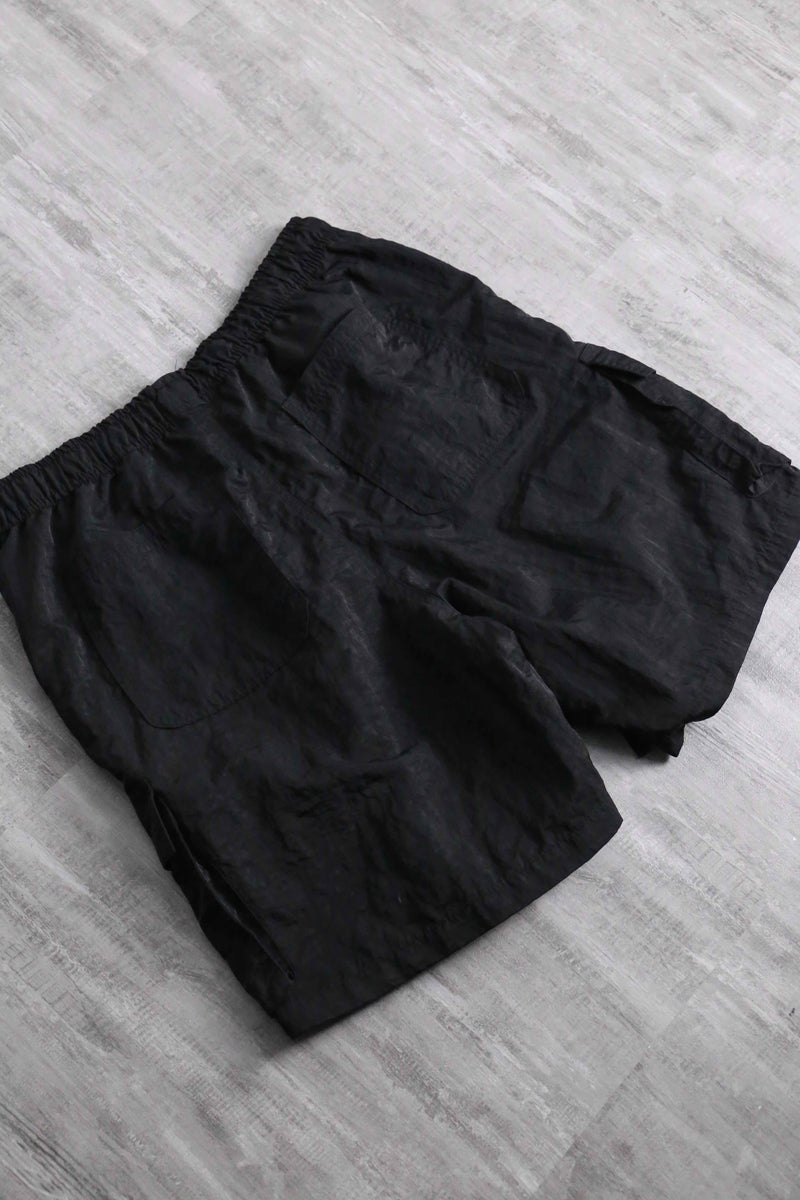 black nylon cargo short pants