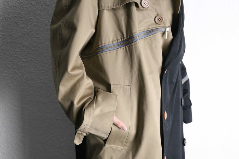 “Re:make” beige × black zip trench coat