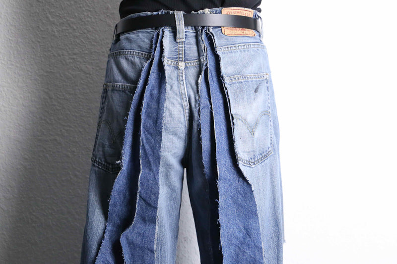 ”Re:make” patchwork stripe denim wide pants