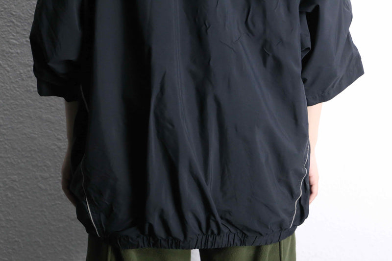 black poly half-zip pullover