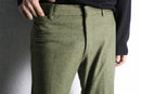 melange green wool flare trousers