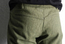 melange green wool flare trousers