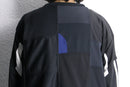 "Re:make" track patchwork pullover