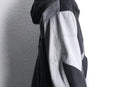 "Re:make" monochrome docking over coat