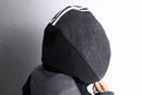 "Re:make" monochrome docking over coat