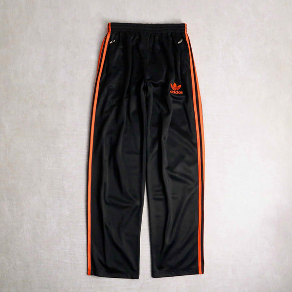 "adidas" black × orange color track pants