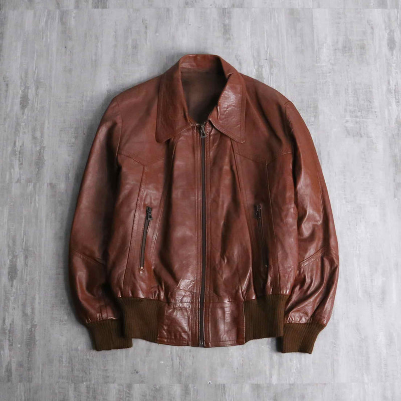 brown wide-collar leather bomber jacket
