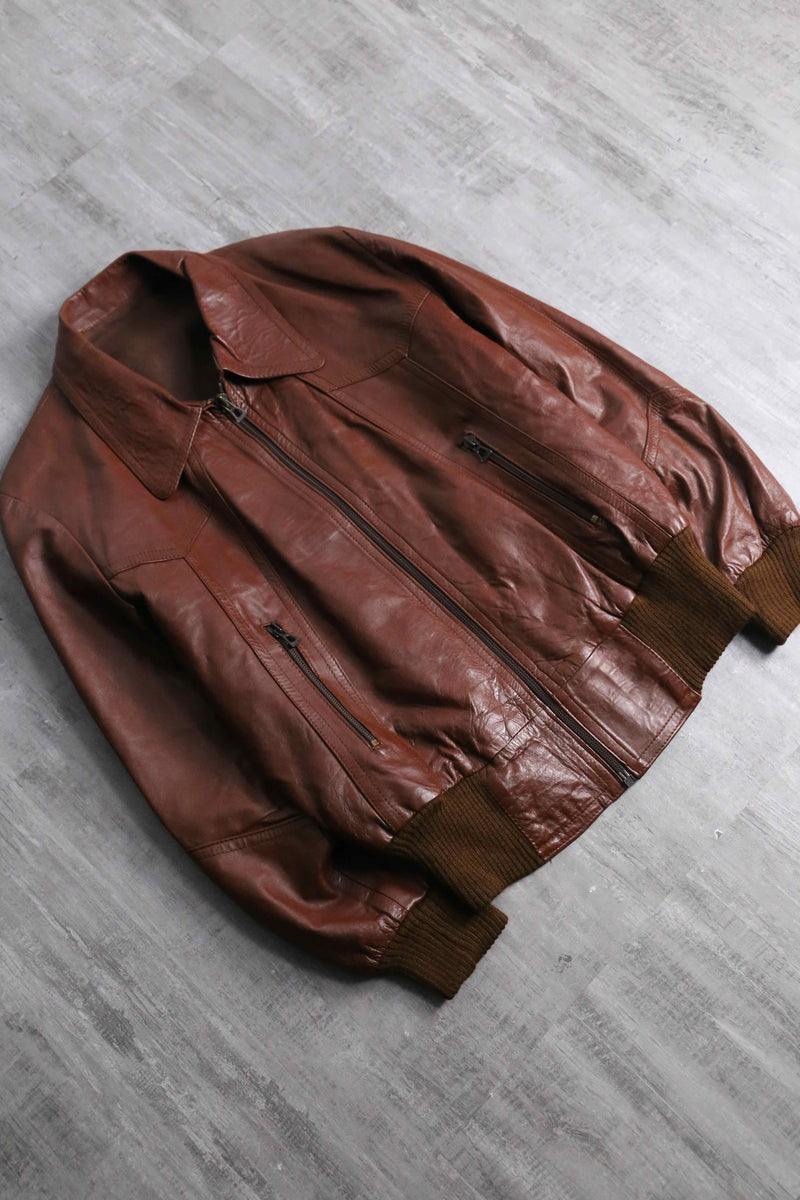 brown wide-collar leather bomber jacket