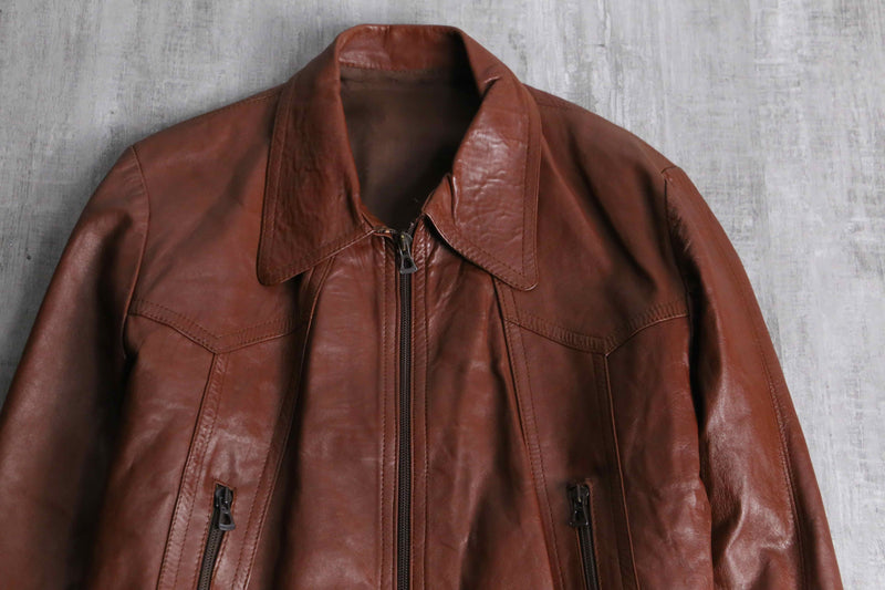 brown wide-collar leather bomber jacket