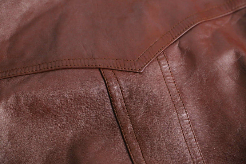 brown wide-collar leather bomber jacket