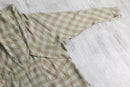 volume neck deformed check pullover
