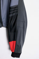 "Re:make" accent red random patchwork track jacket