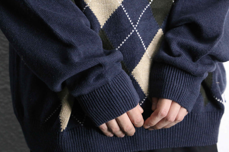 navy argyle pattern knit polo