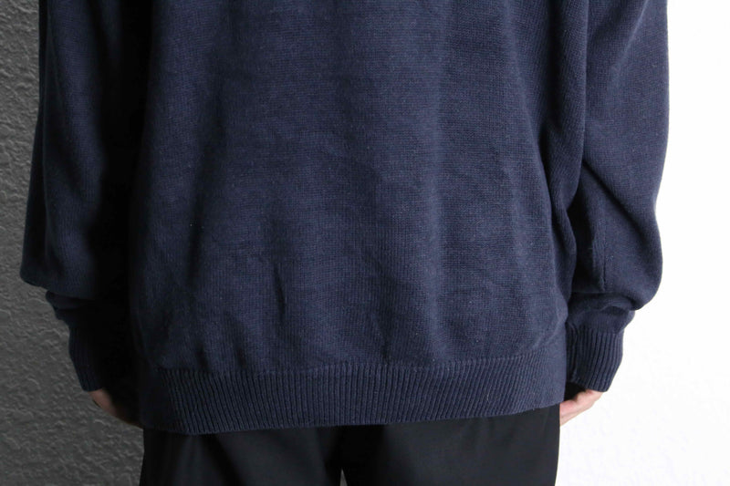 navy argyle pattern knit polo