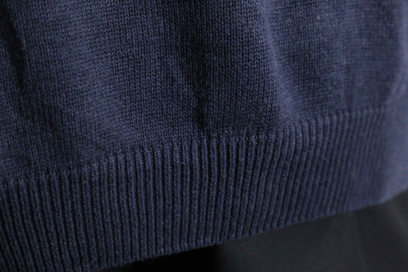 navy argyle pattern knit polo