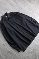 “YVES SAINT LAURENT” faded black shirt