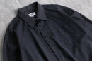 “YVES SAINT LAURENT” faded black shirt