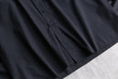 “YVES SAINT LAURENT” faded black shirt