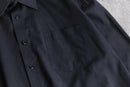 “YVES SAINT LAURENT” faded black shirt