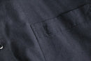 “YVES SAINT LAURENT” faded black shirt