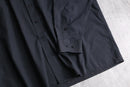 “YVES SAINT LAURENT” faded black shirt