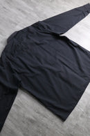 “YVES SAINT LAURENT” faded black shirt