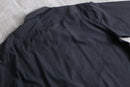 “YVES SAINT LAURENT” faded black shirt