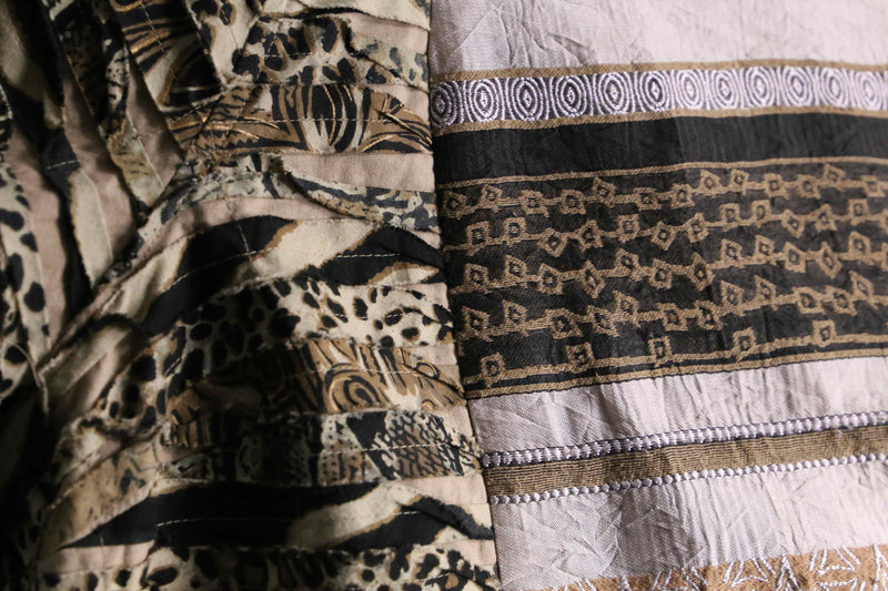 “Re:make “ethnic beast mix docking jacket