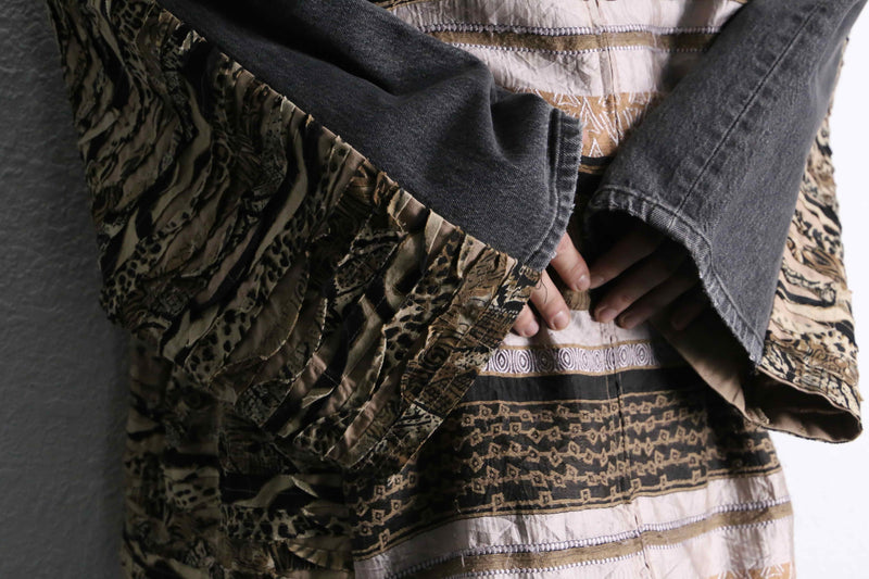 “Re:make “ethnic beast mix docking jacket