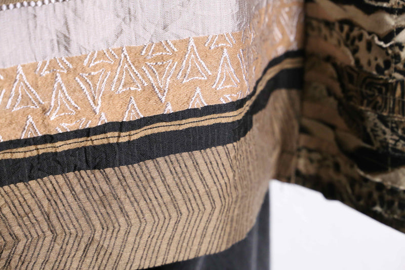 “Re:make “ethnic beast mix docking jacket