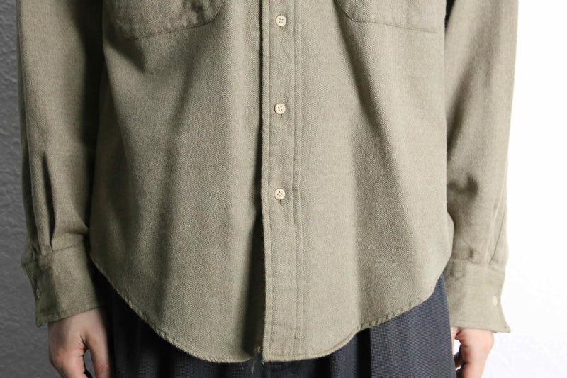 “Calvin Klein” khaki color work motif shirt