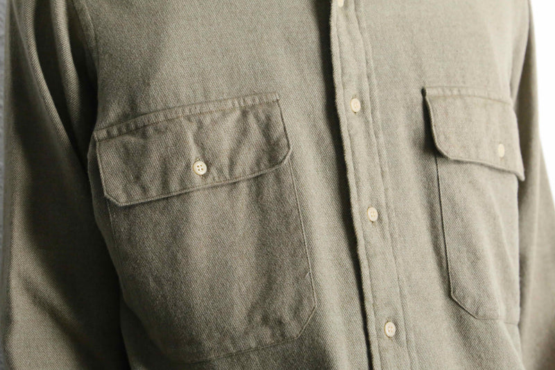 “Calvin Klein” khaki color work motif shirt