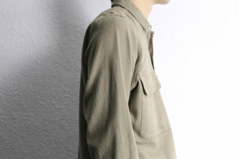 “Calvin Klein” khaki color work motif shirt