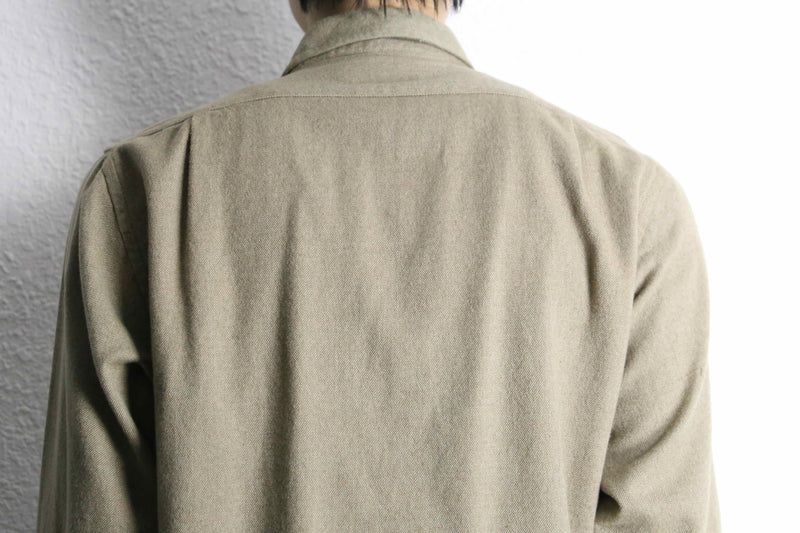 “Calvin Klein” khaki color work motif shirt