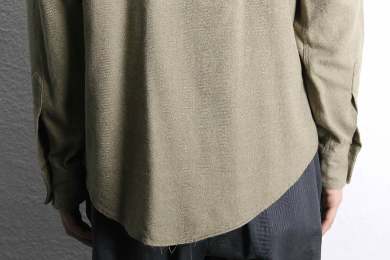 “Calvin Klein” khaki color work motif shirt