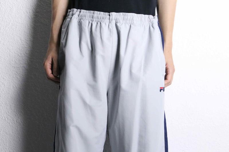 “FILA” navy×gray color track pants