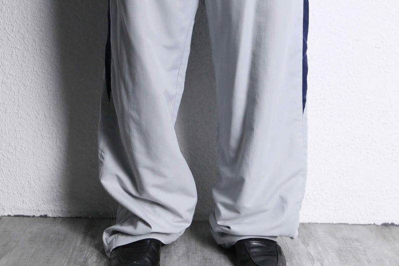 “FILA” navy×gray color track pants