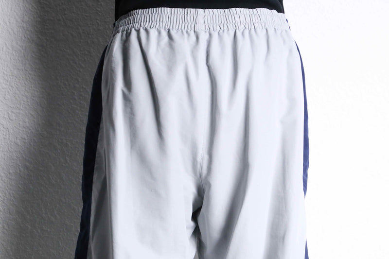 “FILA” navy×gray color track pants