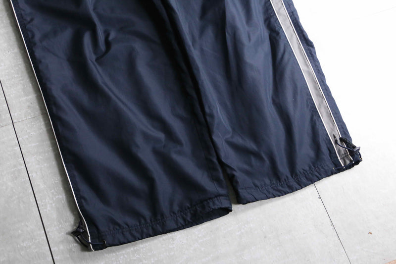 metallic navy color wide silhouette poly track pants