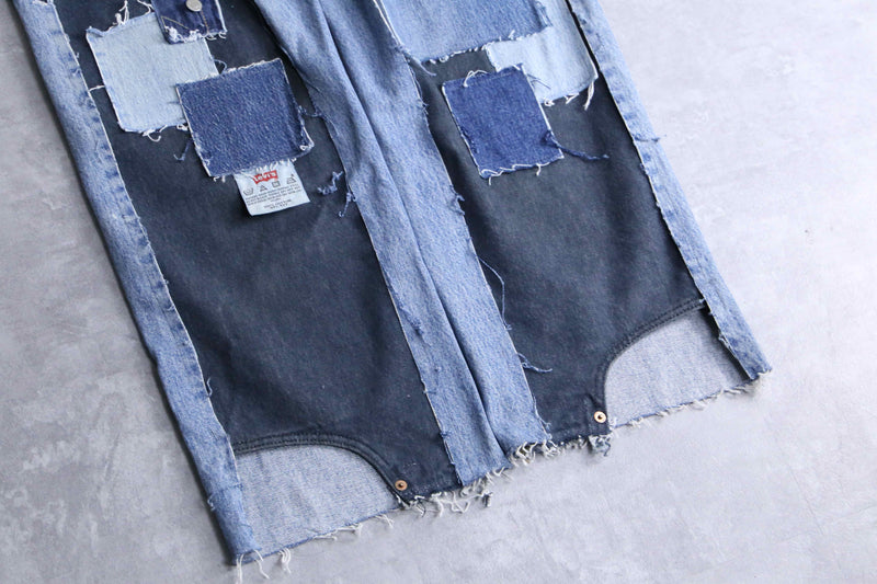 "Re:make" tuck & patch design buggy denim pants