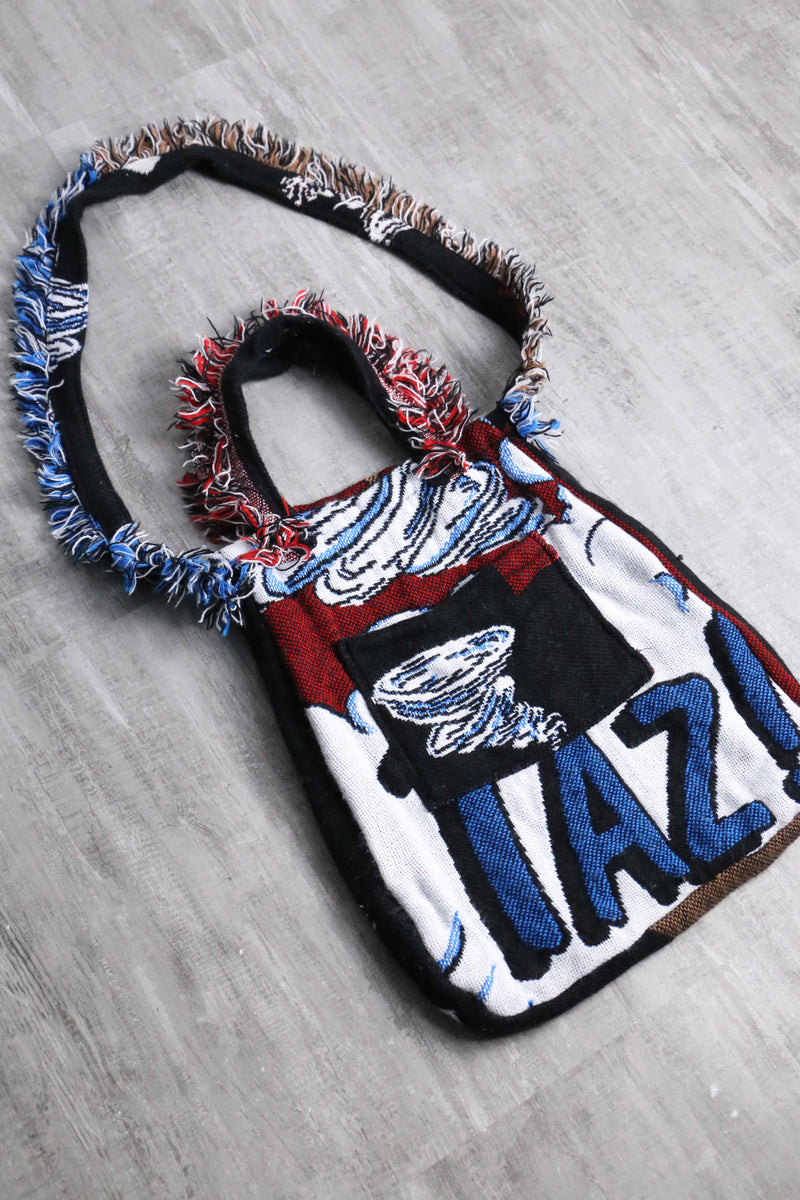 "Re:make" reversible rug bag