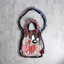 "Re:make" reversible rug bag