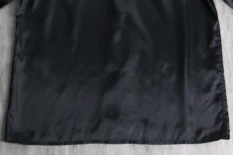 shiny black front fly poly shirt