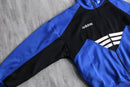 90s "adidas" blue × black geometric panel three stripe track jacket