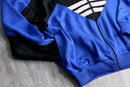 90s "adidas" blue × black geometric panel three stripe track jacket