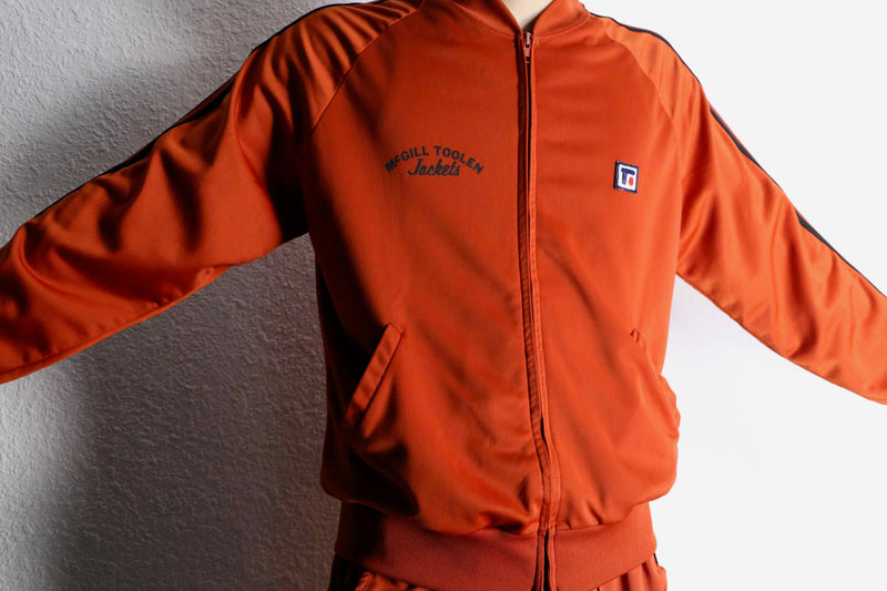 orange color track jacket set up