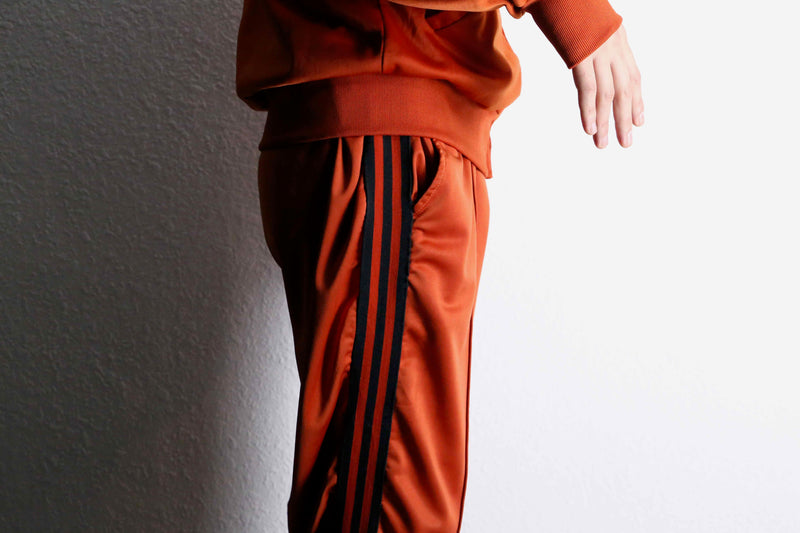 orange color track jacket set up