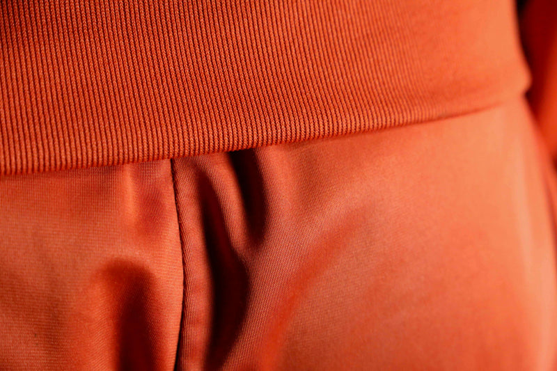 orange color track jacket set up