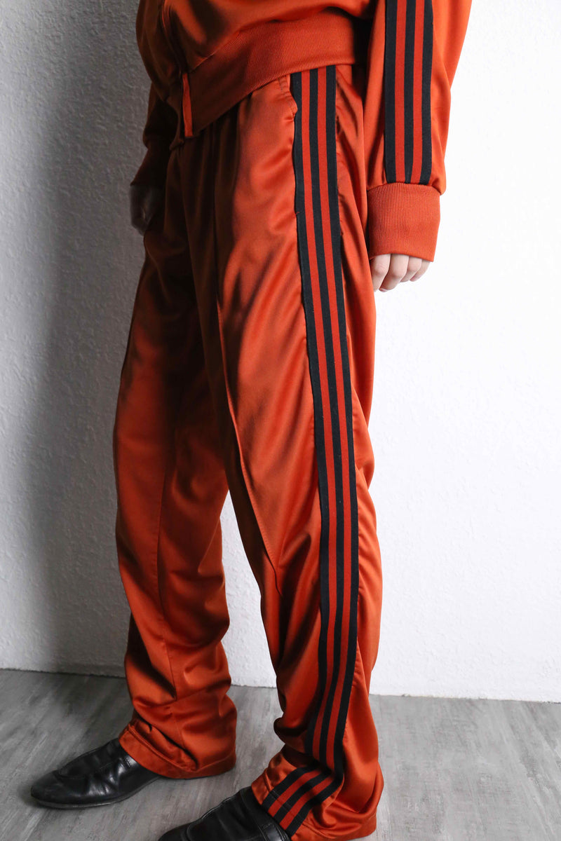 orange color track jacket set up