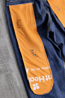 "Re:make" rabbit ear crash docking denim pants